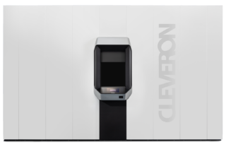 Front view of the Cleveron 403 robotic parcel locker, featuring a prominent black console through which packages can be deposited and retrieved.